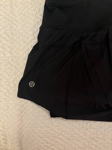 Lululemon size 2 high waisted limited edition flowey shorts with spandex under