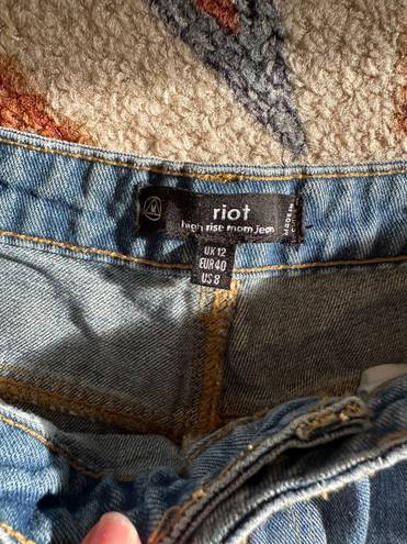 Missguided riot mom jeans with distressed rips in blue