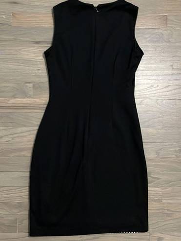 Badgley Mischka  Dress. Sleeveless. Black, white yellow. Size 4.