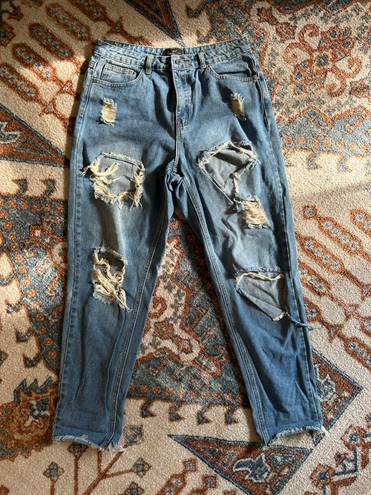 Missguided riot mom jeans with distressed rips in blue