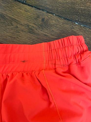 Lululemon Carnation Red  Hotty Hot shorts 4” Low rise