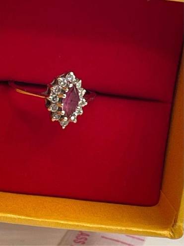 Ruby 14K size 6 white gold  and diamond ring.