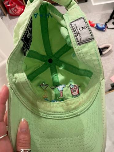 Green baseball cap