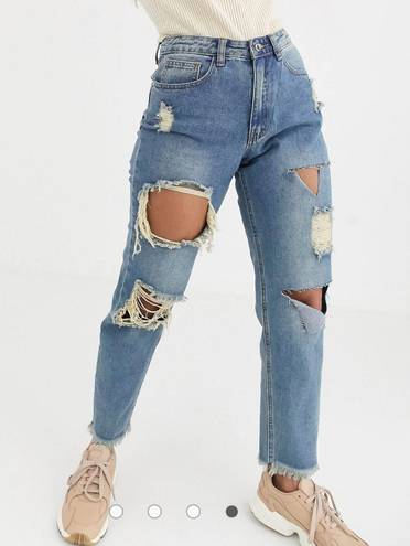 Missguided riot mom jeans with distressed rips in blue