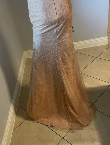 Cinderella Divine Women’s formal sparkly dress size 4
Brand is 
Rose gold color