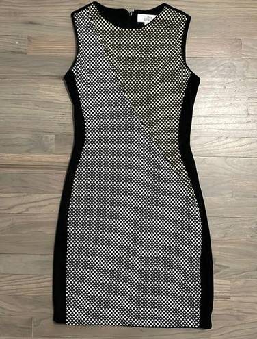 Badgley Mischka  Dress. Sleeveless. Black, white yellow. Size 4.