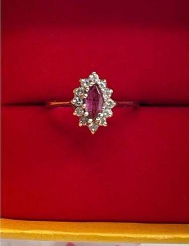 Ruby 14K size 6 white gold  and diamond ring.