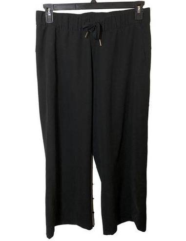 Lululemon ‎ On the Fly 7/8 Pant *Woven Black Sz 8 - $50 - From Teri