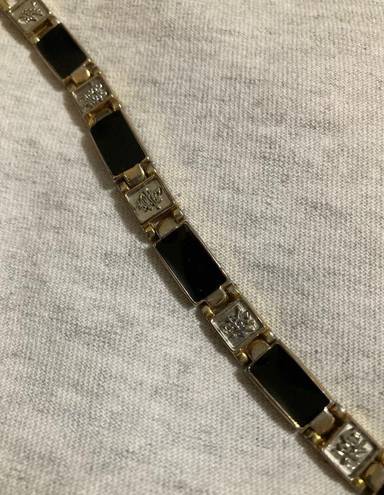 Unique Vintage  gold-tone bracelet with black and silver design