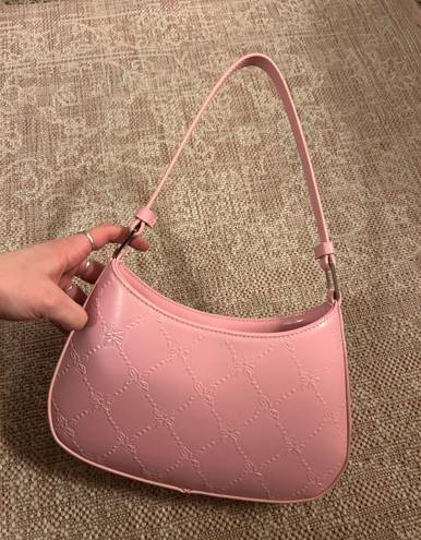 Urban Outfitters pink butterfly purse