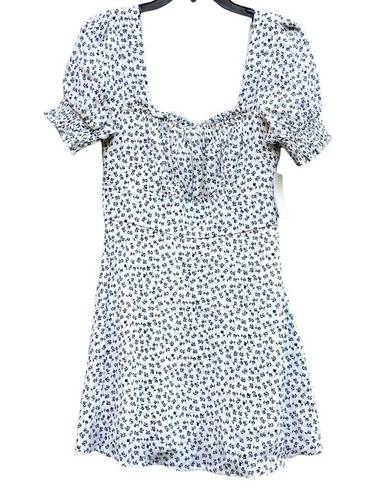 The Row  A White Ditzy Floral Scoop Neck Smocked Mini Dress Women’s Medium NWT