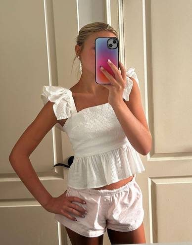 Francesca's white ruffle top