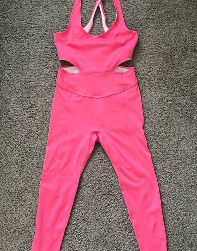 Free People Movement FP Movement “back it up” onesie in the dragonfruit color