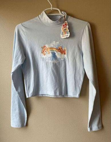 Teddy Fresh  X Care Bears Long Sleeve Collared Crop in Baby Blue Size Medium