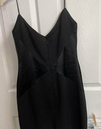 Badgley Mischka   black mini dress size 6 waist accenting spaghetti straps