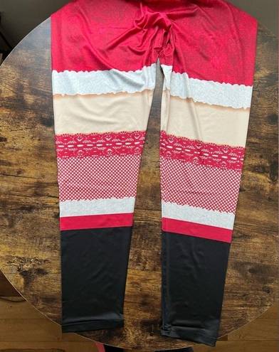 ma*rs Rockin’ Around womens Christmas . Claus leggings. Size: L