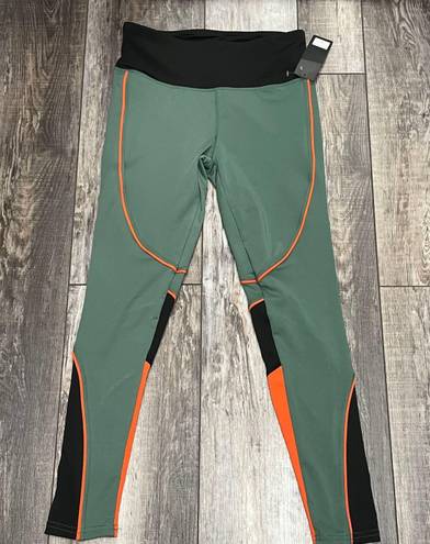 Kimberly NWT  Color Block Green Orange Black Leggings Size Medium