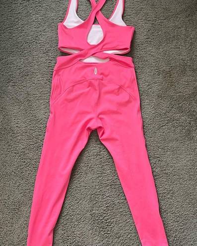 Free People Movement FP Movement “back it up” onesie in the dragonfruit color