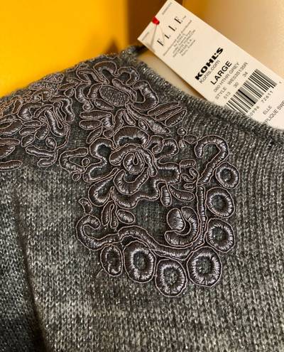 Elle Women's original sweater. Size L.  brand. $35.