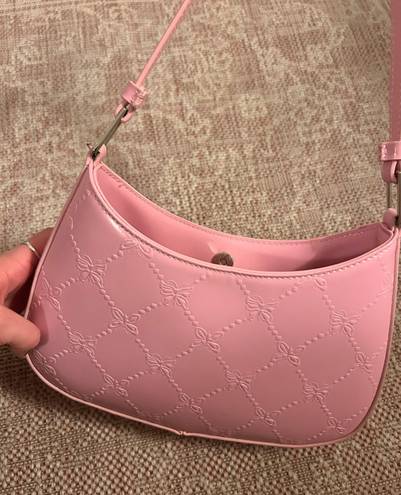 Urban Outfitters pink butterfly purse