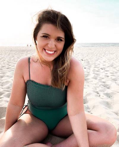 One Piece Green Swim Suit With Side Cut Outs