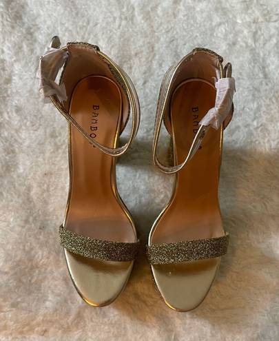 Bamboo Gold metallic glittery felt platform pump high heels with clear buckle straps