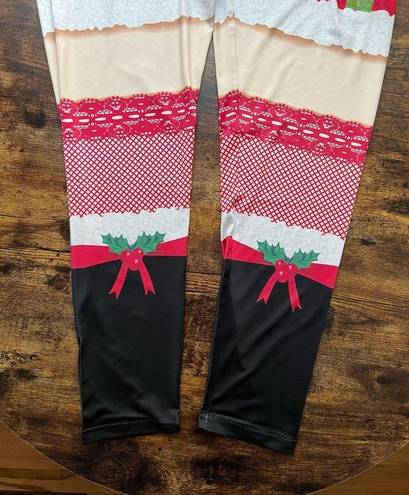 ma*rs Rockin’ Around womens Christmas . Claus leggings. Size: L