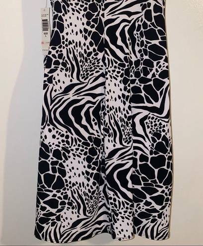 Tiana B . Black and White Sleeveless Wrap Around Dress 🆕 size large