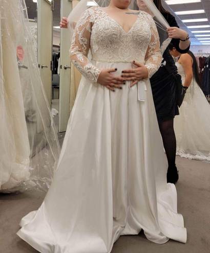 Oleg Cassini long sleeve satin applique wedding dress