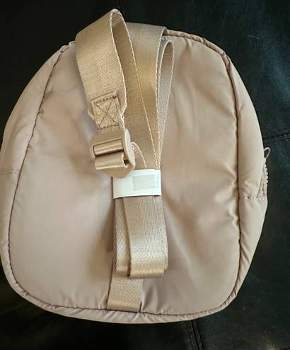 Danskin NWT  Lowry small sling backpack