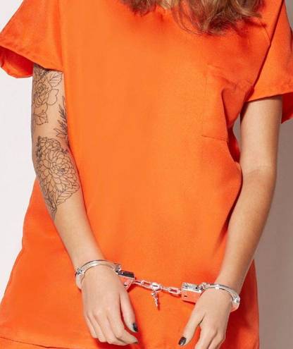 Spirit Halloween NWOT Inmate Costume