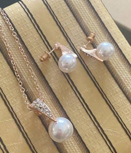 Matching Faux Pearl and Rhinestone Pendant Necklace and Earring Set.