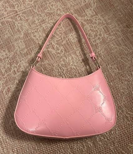 Urban Outfitters pink butterfly purse