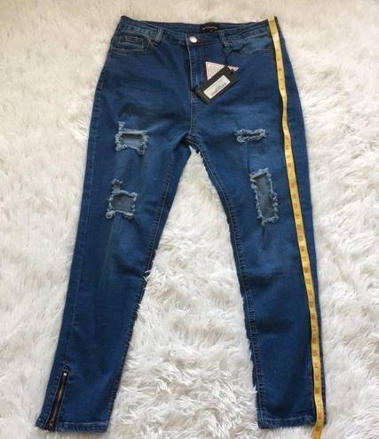 Pretty Little Thing  Khloe Extreme rip Women’s Skinny Jeans in Medium wash size 10