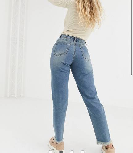 Missguided riot mom jeans with distressed rips in blue