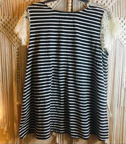 Umgee  striped babydoll top with lace sleeves and detailing. Size:L