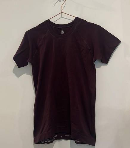 Sweaty Betty  athletic seem less workout short sleeve maroon t shirt. Size large