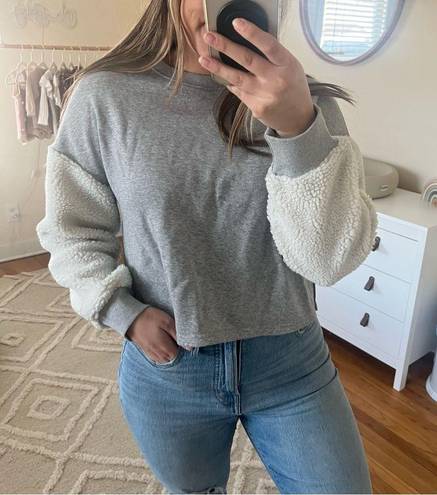 The Row all: grey cropped Sherpa-sleeved sweater