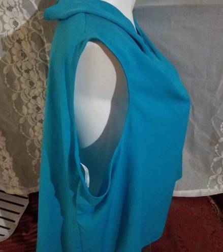 Nike  size small dry fit turquoise topbust 36 inches length 25 “short sleeve