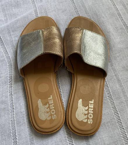 Sorel  two toned metallic slip on sandals.