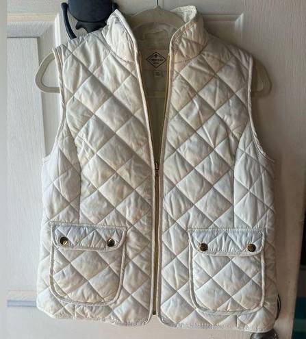 St. John’s Bay White puffer vest with gold accents