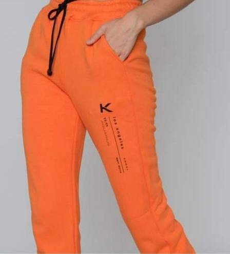 Koral  Oblivion Matte Sweatpant in Jaspar Orange