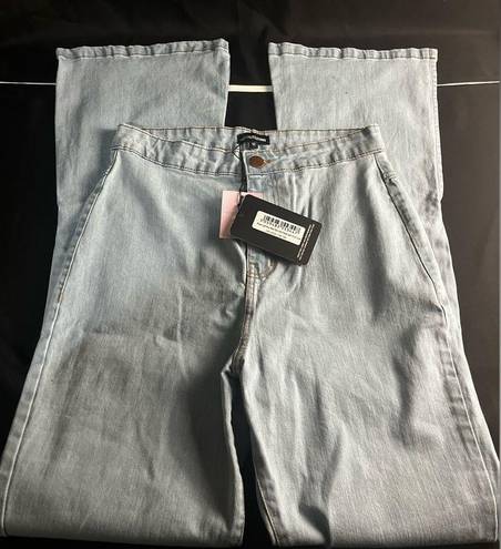 Pretty Little Thing  Shape Light‎ Blue Wash Split Hem Detail Flared Jeans NWT 12