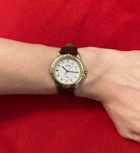 Woman’s 3 ATM WR Lorelli two tone quartz mov wrist watch Multiple