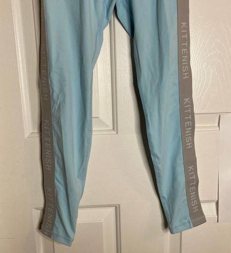 Kittenish  NEW with tags, teal blue active leggings size XS, athleisure, panels