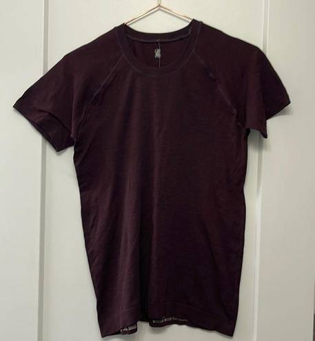 Sweaty Betty  athletic seem less workout short sleeve maroon t shirt. Size large