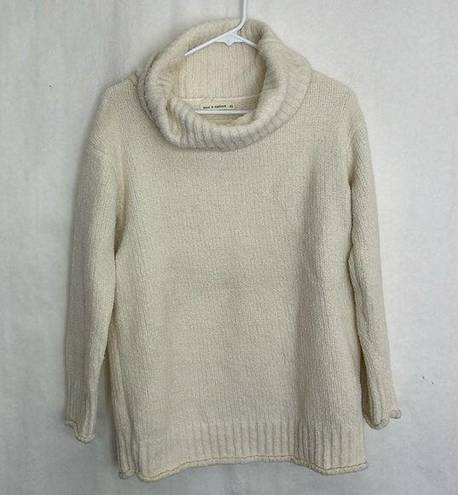 The Moon  and Madison XS. Cream turtle neck sweater.130