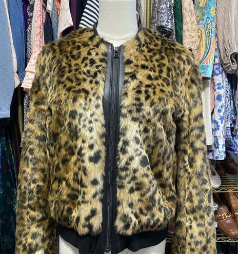 Uniqlo  By Carine Roitfeld faux fur bomber jacket, size large.