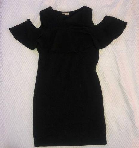 Caution to the Wind Fitted black dress with ruffle cut out detail