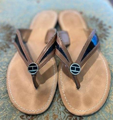 Tommy Hilfiger  faux leather tan and black thong sandals in size 8